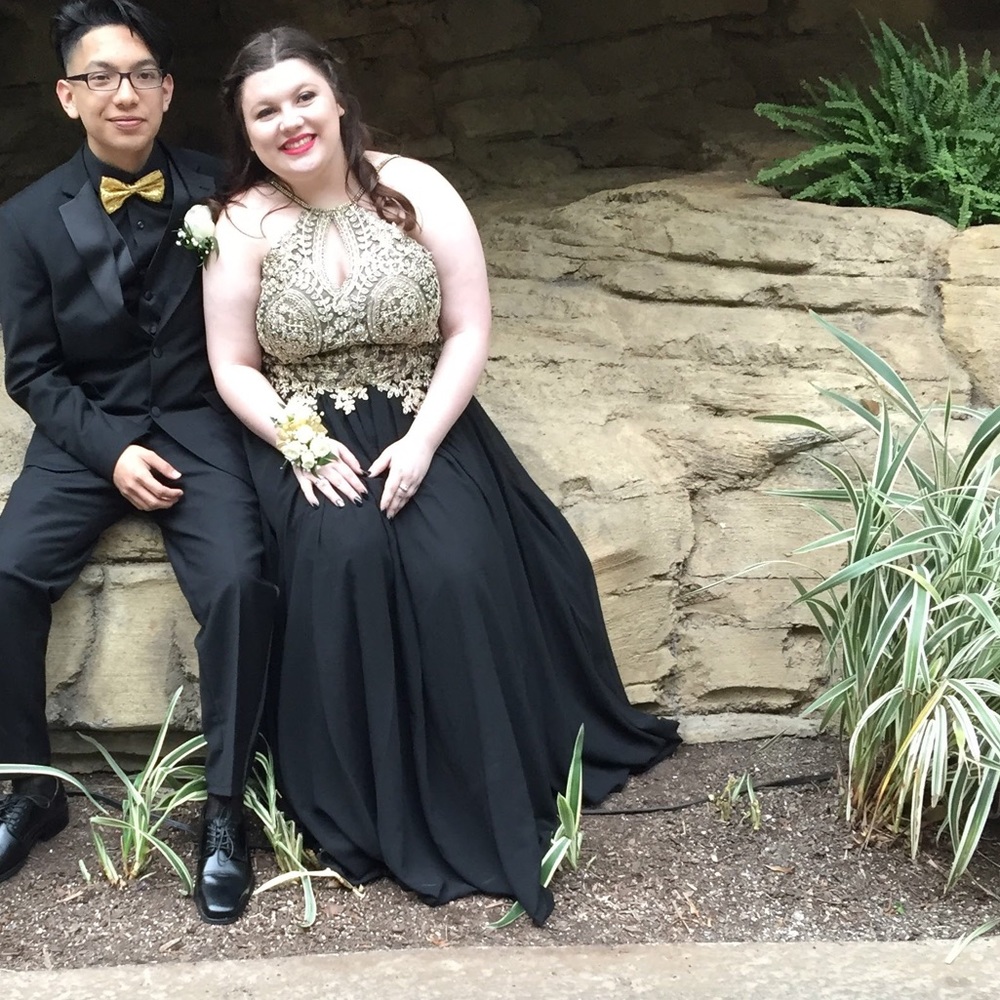 Long black and gold prom dress